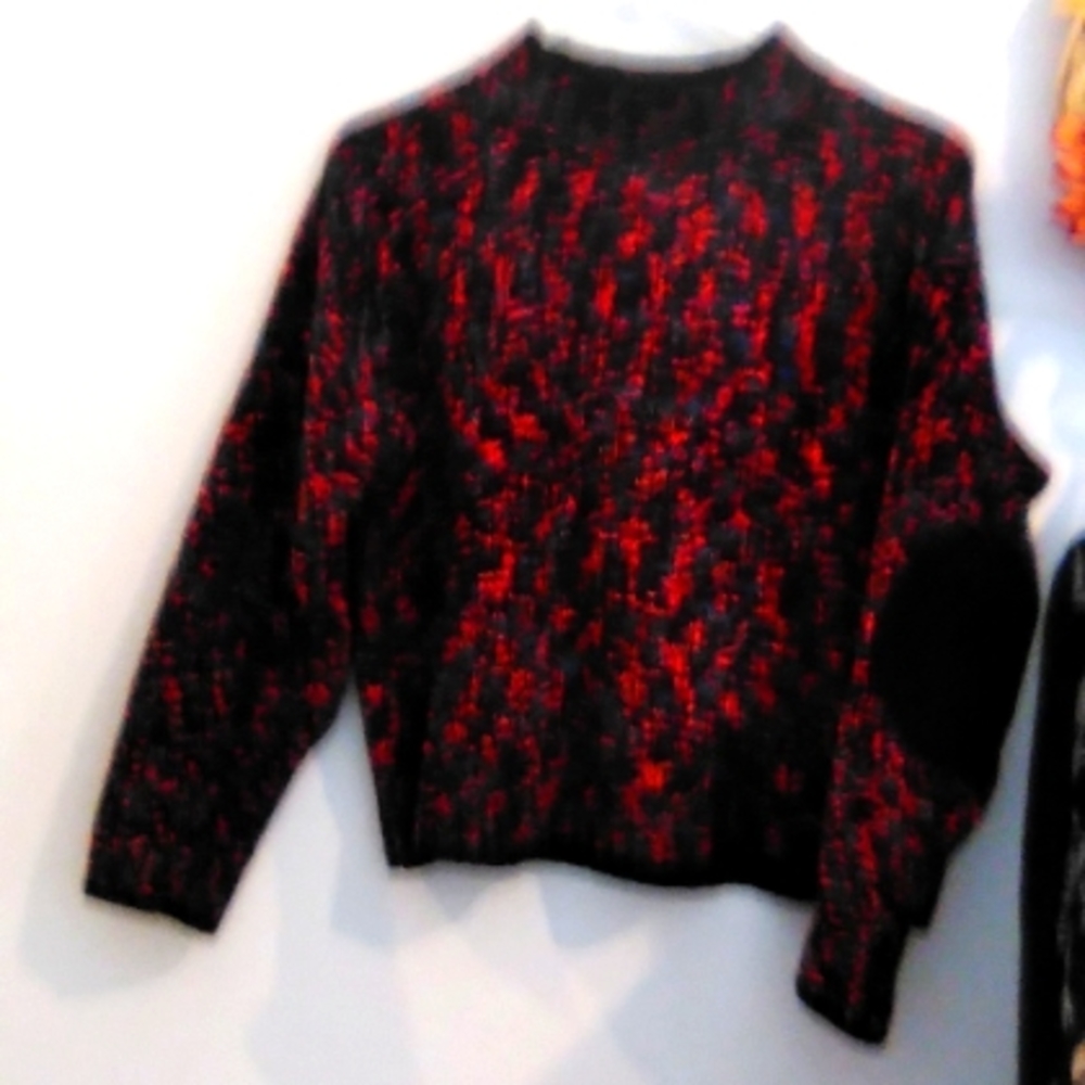 100 percent acrylic long sleeved sweater.
